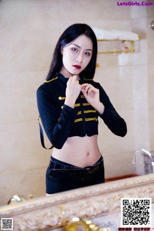 A woman in a military uniform posing for a picture.